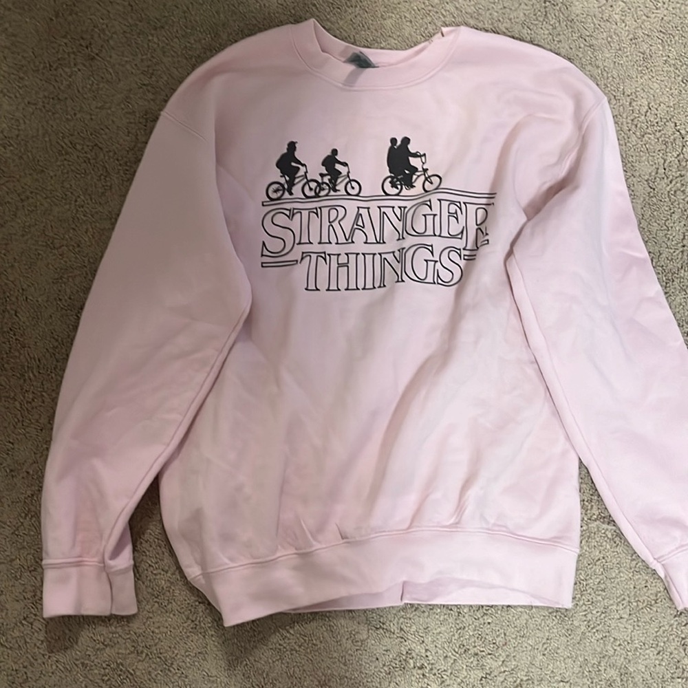 light pink stranger things sweatshirt